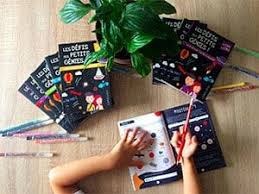 Les livres Les défis des petits génies, avec un enfant qui fait un exercice